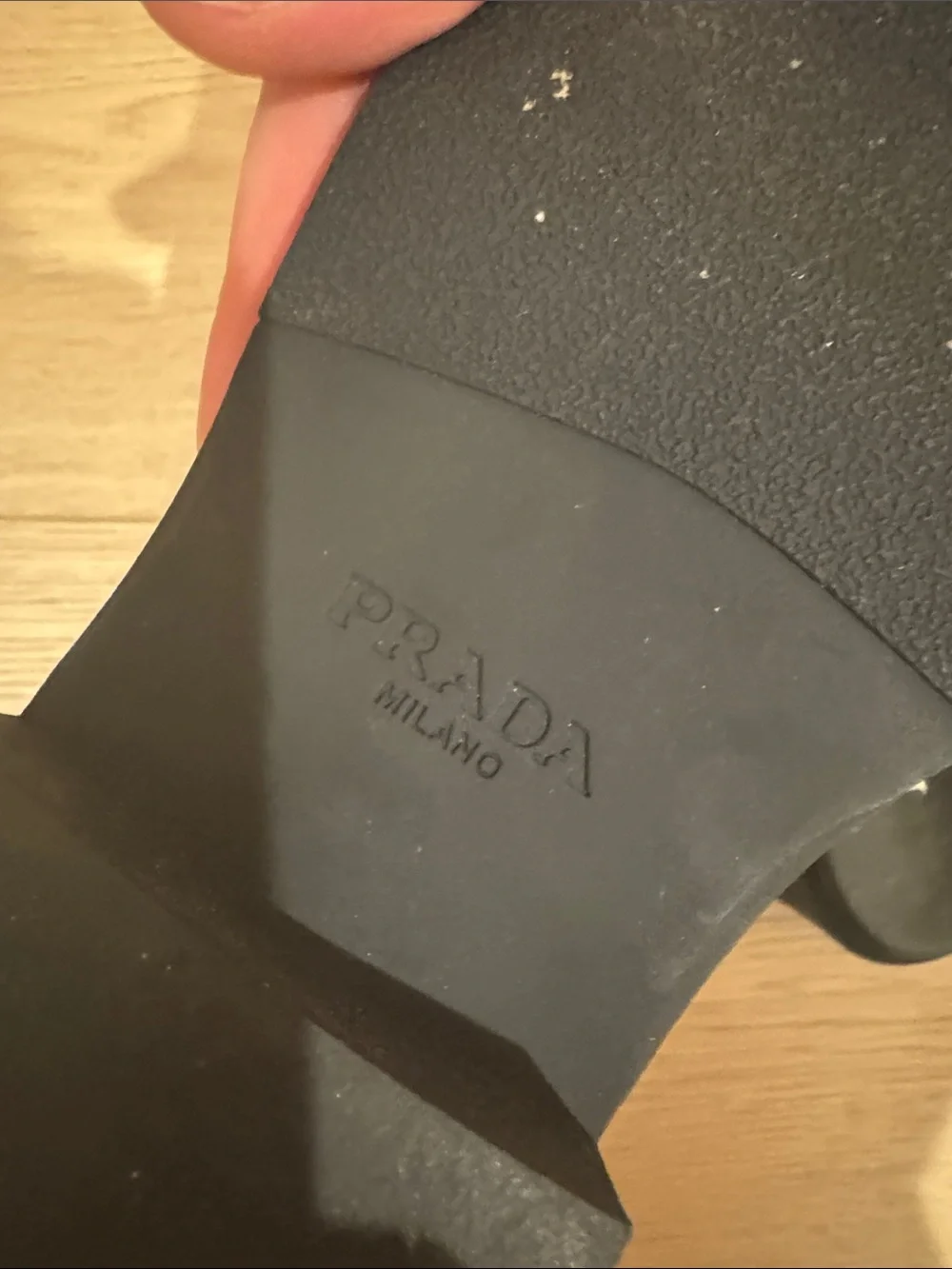 Prada women’s Black Leather Slide Loafers with Triangle Logo
